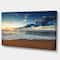 Designart - Sunrise and Glowing Waves in Ocean - Seascape Canvas Art Print